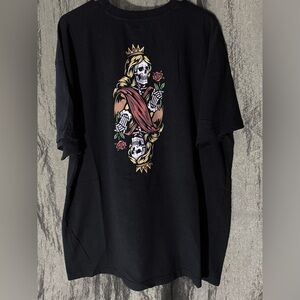 Men’s graphic t-shirt featuring a skeleton Queen of Spades playing card design.